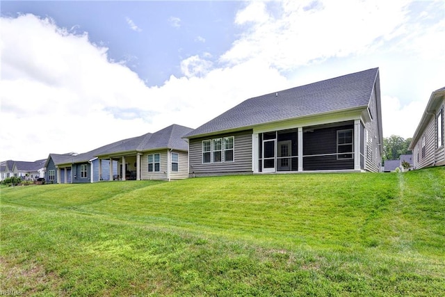 3998 Isaac Cir, Williamsburg, VA 23188 - back of house with a lawn and a sunroom