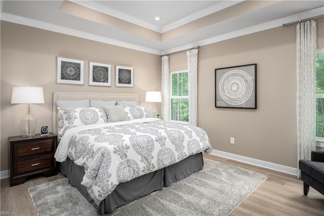 105 Repose Rd, Williamsburg, VA 23185 - bedroom featuring wood finished floors, a raised ceiling, ornamental molding, and recessed lighting