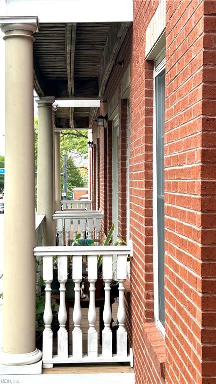 450 W Princess Anne Rd Unit 208, Norfolk, VA 23517 - bar with brick wall and ornate columns