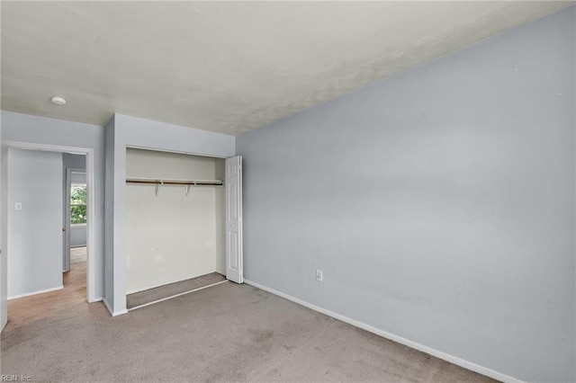6625 Stoney Pt, Norfolk, VA 23502 - unfurnished bedroom featuring a closet and carpet