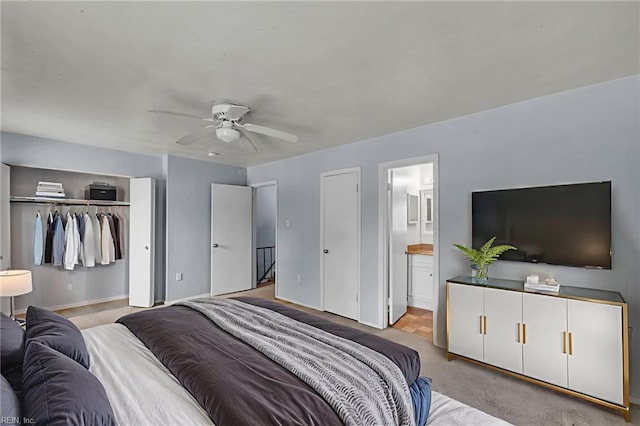 6625 Stoney Pt, Norfolk, VA 23502 - bedroom featuring light colored carpet, ensuite bathroom, ceiling fan, and a closet