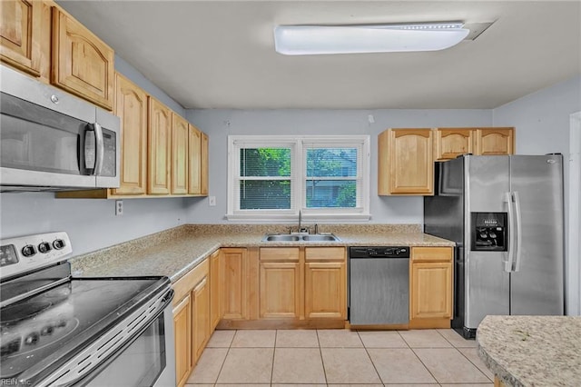 6625 Stoney Pt, Norfolk, VA 23502 - kitchen featuring appliances with stainless steel finishes, light brown cabinetry, light tile patterned floors, and light countertops