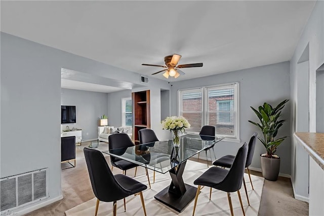 6625 Stoney Pt, Norfolk, VA 23502 - dining space with a ceiling fan and light colored carpet