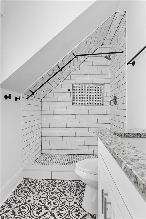 2850 Grandy Ave, Norfolk, VA 23509 - bathroom featuring a shower stall, vanity, and tile patterned flooring