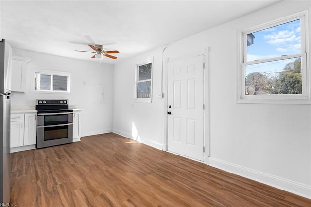 2850 Grandy Ave, Norfolk, VA 23509 - kitchen featuring stainless steel appliances, a ceiling fan, light countertops, and white cabinets
