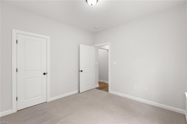 140 Benefit Rd, Chesapeake, VA 23322 - unfurnished bedroom featuring carpet floors and baseboards