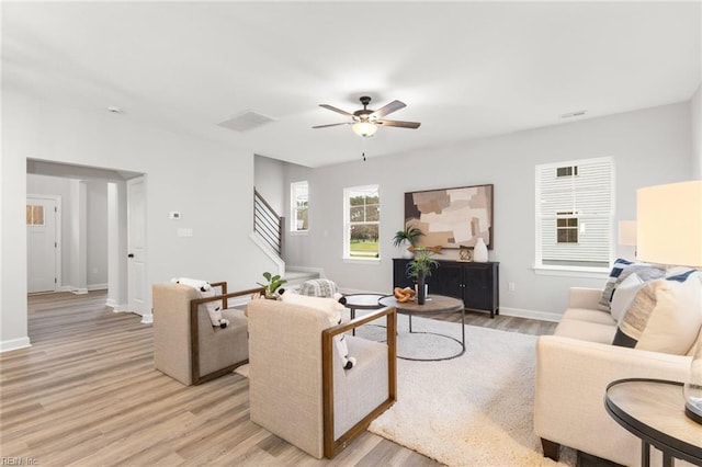 140 Benefit Rd, Chesapeake, VA 23322 - living room with a ceiling fan, light wood-style flooring, and stairs