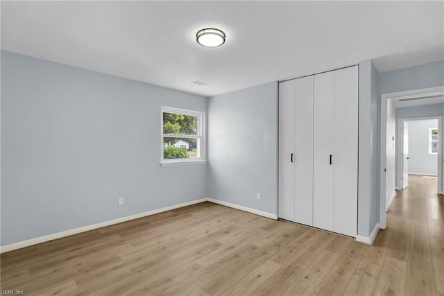 3 Maume Cir, Hampton, VA 23666 - unfurnished bedroom featuring light wood-style floors and a closet