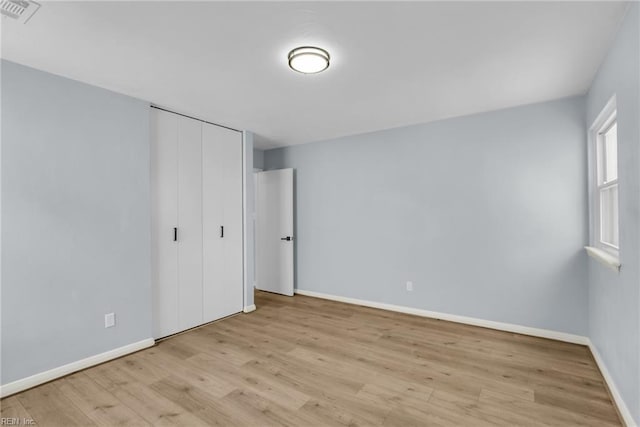 3 Maume Cir, Hampton, VA 23666 - unfurnished bedroom featuring wood finished floors and a closet