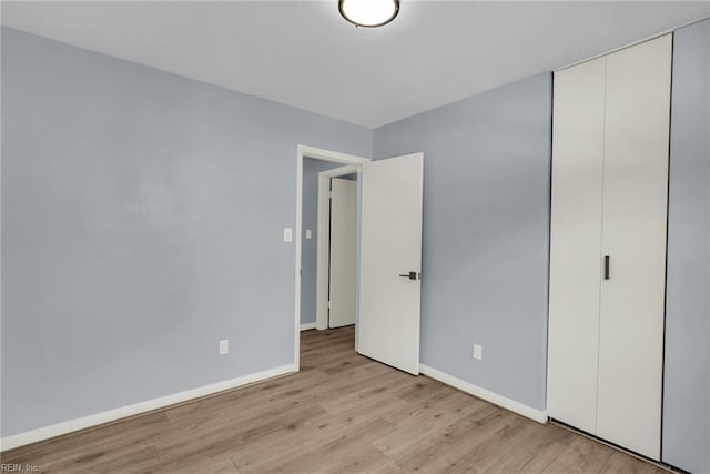 3 Maume Cir, Hampton, VA 23666 - unfurnished bedroom with wood finished floors and a closet