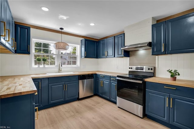 3 Maume Cir, Hampton, VA 23666 - kitchen featuring appliances with stainless steel finishes, wooden counters, blue cabinetry, extractor fan, and light wood finished floors