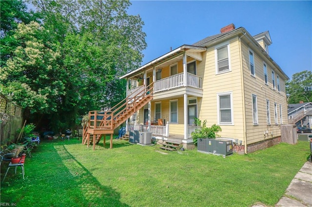 1439 Moultrie Ave, Norfolk, VA 23509 - rear view of property featuring a balcony, stairway, a chimney, and covered porch
