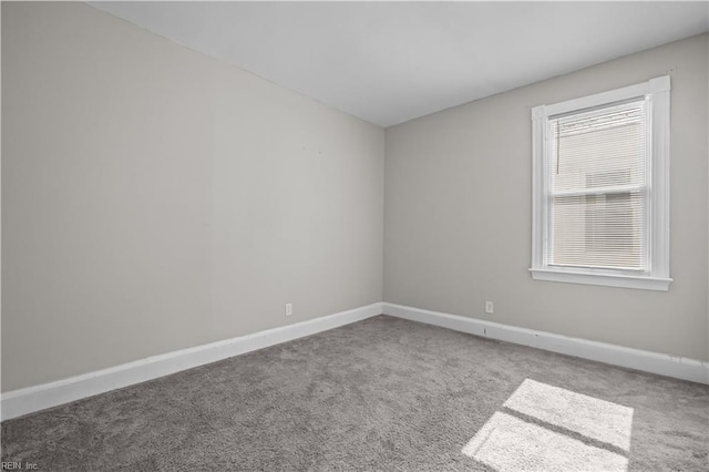 256 Lee St, Hampton, VA 23669 - carpeted empty room with baseboards