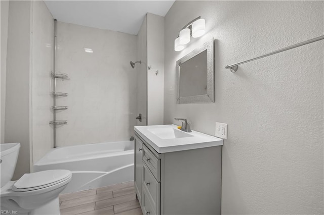 256 Lee St, Hampton, VA 23669 - full bath with vanity, shower / washtub combination, a textured wall, and wood finished floors