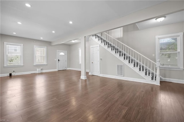 256 Lee St, Hampton, VA 23669 - unfurnished living room featuring stairs, wood finished floors, plenty of natural light, and recessed lighting