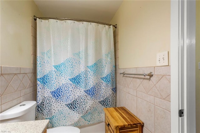 963 Woodrow Ave Unit A, Norfolk, VA 23517 - bathroom featuring tile walls, vanity, a shower with shower curtain, and wainscoting