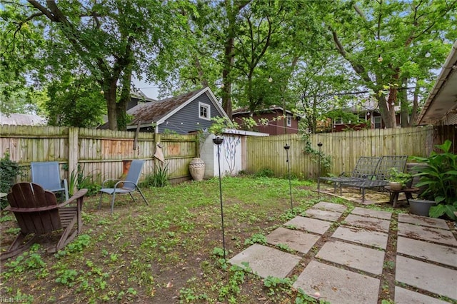 963 Woodrow Ave Unit A, Norfolk, VA 23517 - fenced backyard with a patio