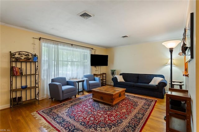 963 Woodrow Ave Unit A, Norfolk, VA 23517 - living area featuring wood finished floors and ornamental molding