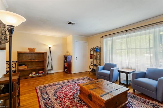 963 Woodrow Ave Unit A, Norfolk, VA 23517 - living area featuring wood finished floors and ornamental molding