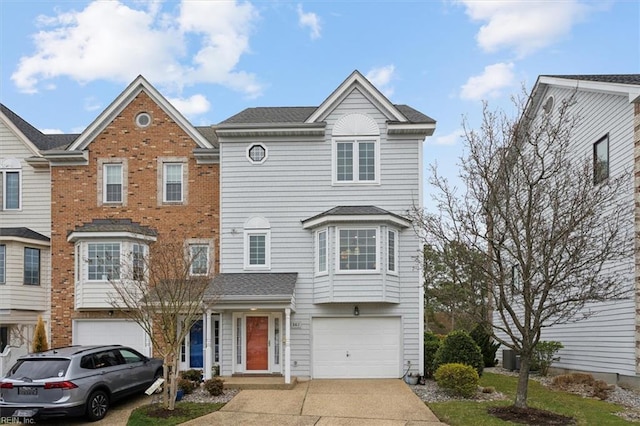 367 Mainsail Dr Unit 23, Hampton, VA 23664 - view of front of house featuring concrete driveway and a garage