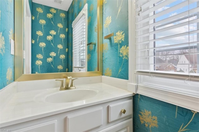 367 Mainsail Dr Unit 23, Hampton, VA 23664 - bathroom featuring vanity and wallpapered walls