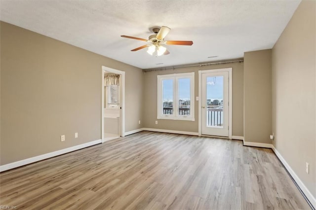 367 Mainsail Dr Unit 23, Hampton, VA 23664 - empty room with wood finished floors and ceiling fan