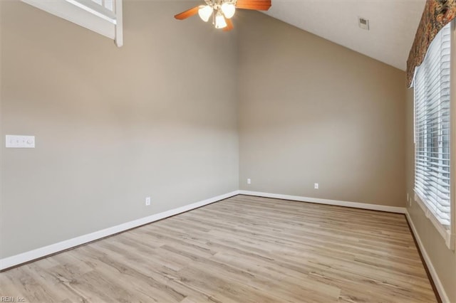 367 Mainsail Dr Unit 23, Hampton, VA 23664 - spare room with a ceiling fan, healthy amount of natural light, wood finished floors, and high vaulted ceiling