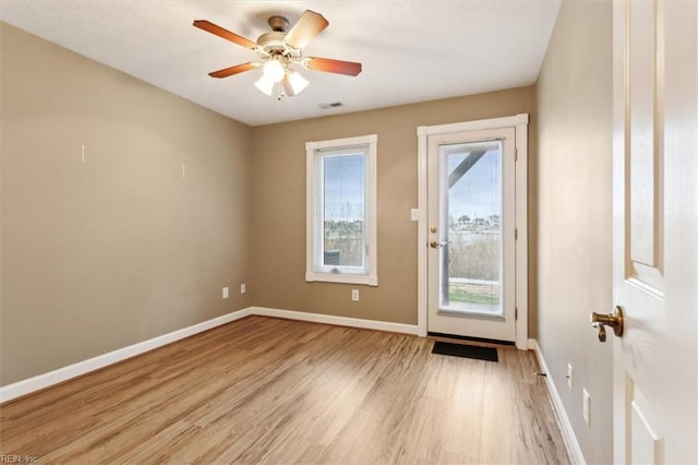 367 Mainsail Dr Unit 23, Hampton, VA 23664 - doorway to outside with light wood-type flooring and a ceiling fan