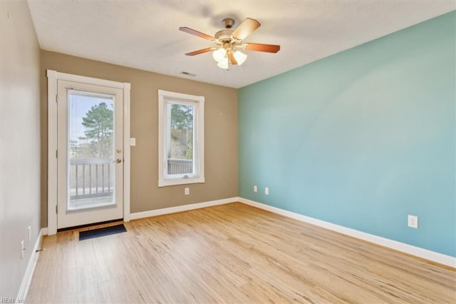 367 Mainsail Dr Unit 23, Hampton, VA 23664 - empty room featuring light wood-type flooring and a ceiling fan