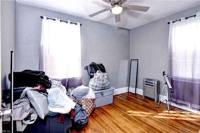 387 Sampson Ave, Hampton, VA 23661 - misc room with plenty of natural light, wood finished floors, a ceiling fan, and a textured ceiling