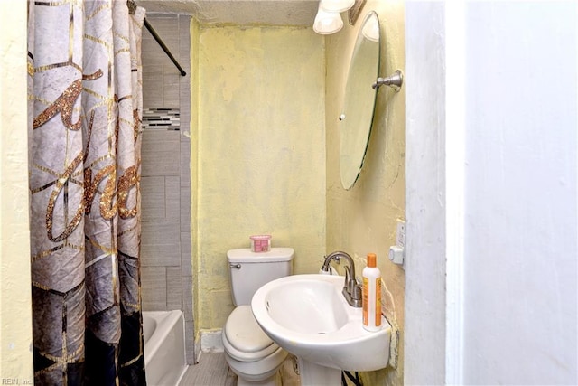 387 Sampson Ave, Hampton, VA 23661 - full bathroom with a sink and shower / bath combo with shower curtain