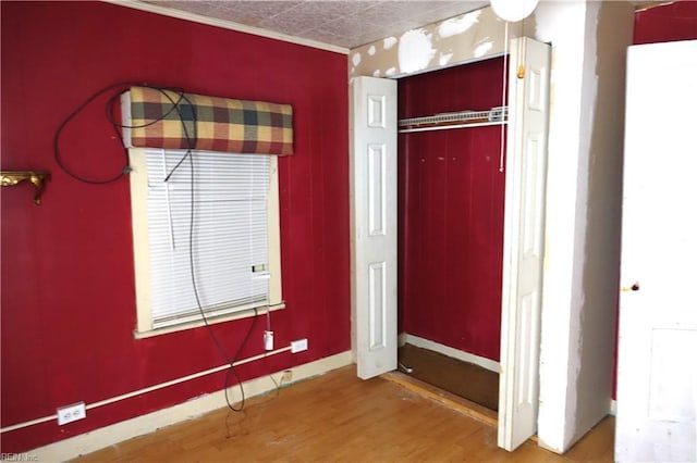 806 Lee St, West Point, VA 23181 - unfurnished bedroom with wood finished floors and a closet
