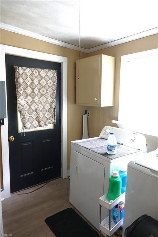 806 Lee St, West Point, VA 23181 - washroom with independent washer and dryer, cabinet space, ornamental molding, and wood finished floors