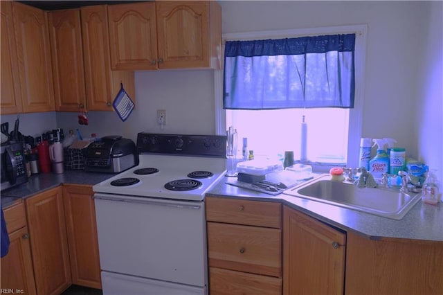 806 Lee St, West Point, VA 23181 - kitchen featuring white electric stove and a sink