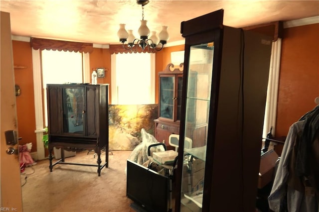 806 Lee St, West Point, VA 23181 - carpeted dining space featuring a chandelier