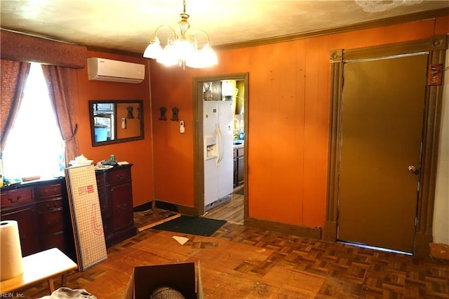 806 Lee St, West Point, VA 23181 - hallway featuring a wall mounted AC, a chandelier, and crown molding