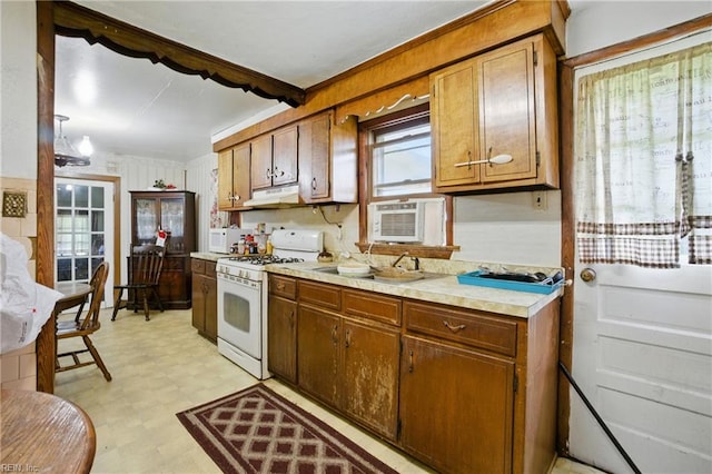 1816 Long Ridge Rd, Chesapeake, VA 23323 - kitchen with white appliances, under cabinet range hood, light flooring, light countertops, and cooling unit