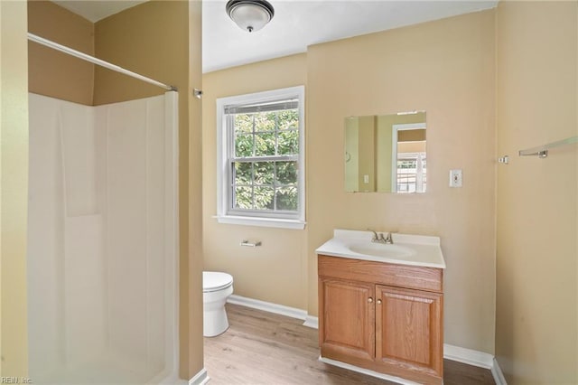 1118 35th St, Newport News, VA 23607 - full bath featuring wood finished floors, a shower, and vanity