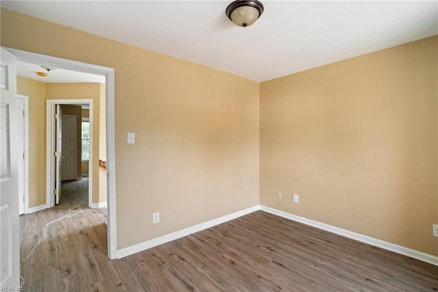 1118 35th St, Newport News, VA 23607 - empty room featuring wood finished floors and baseboards