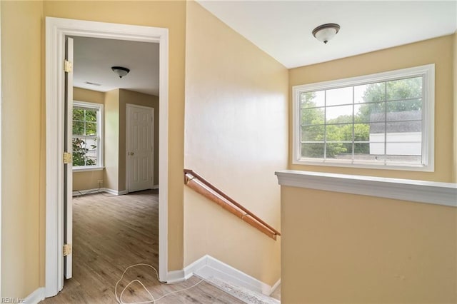1118 35th St, Newport News, VA 23607 - hallway with an upstairs landing and wood finished floors