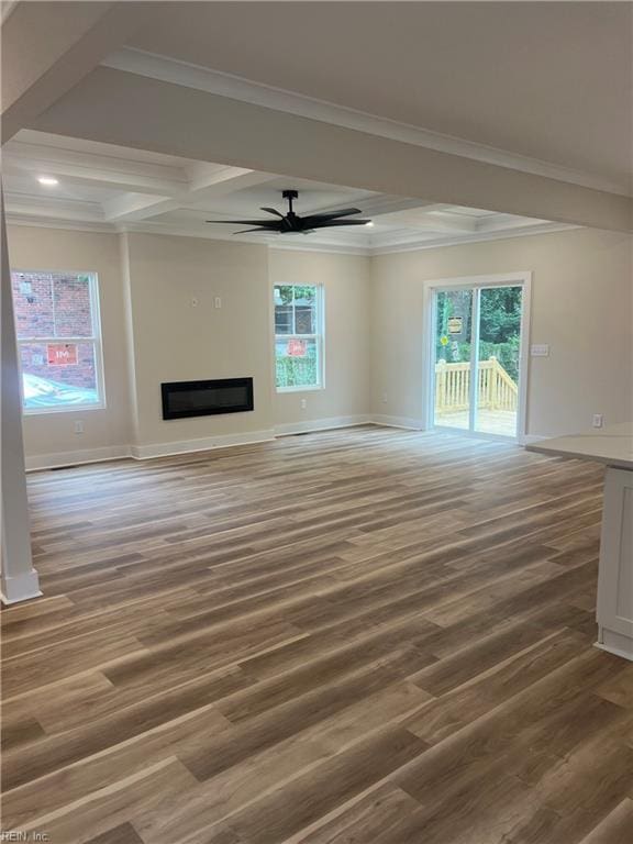 1635 E Bayview Blvd, Norfolk, VA 23503 - unfurnished living room with wood finished floors, healthy amount of natural light, ceiling fan, coffered ceiling, and beamed ceiling