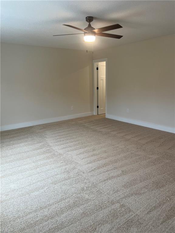 1635 E Bayview Blvd, Norfolk, VA 23503 - empty room with ceiling fan and carpet
