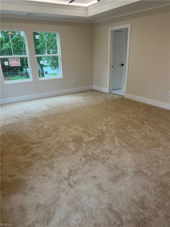 1635 E Bayview Blvd, Norfolk, VA 23503 - spare room featuring carpet flooring and crown molding