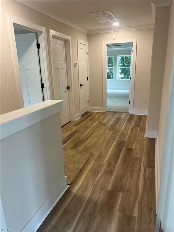 1635 E Bayview Blvd, Norfolk, VA 23503 - hallway featuring wood finished floors and crown molding