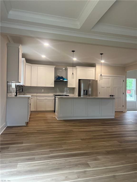 1635 E Bayview Blvd, Norfolk, VA 23503 - kitchen with stainless steel fridge with ice dispenser, ornamental molding, wood finished floors, backsplash, and a kitchen island