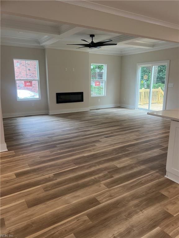 1635 E Bayview Blvd, Norfolk, VA 23503 - unfurnished living room with coffered ceiling, wood finished floors, a glass covered fireplace, healthy amount of natural light, and a ceiling fan