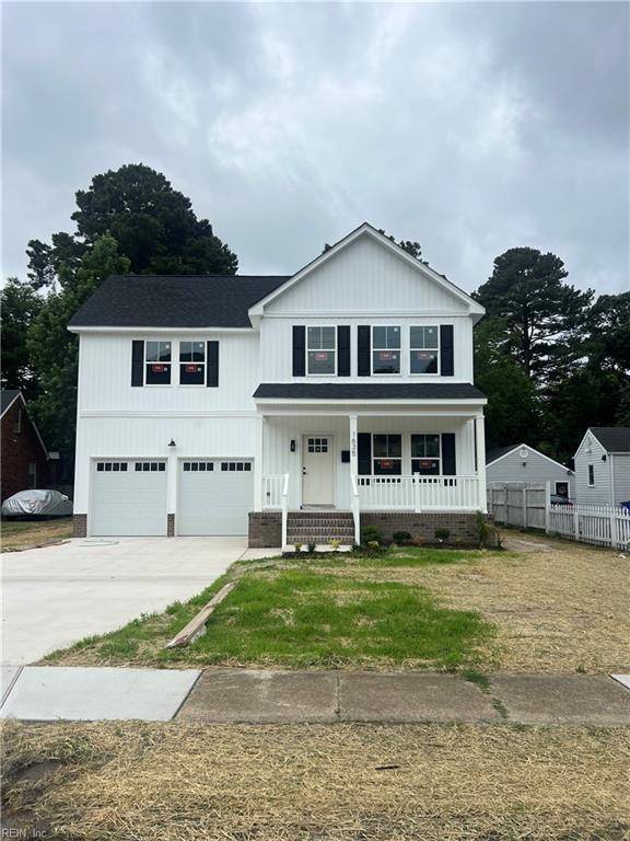 1635 E Bayview Blvd, Norfolk, VA 23503 - view of front facade featuring an attached garage, a porch, driveway, and a shingled roof