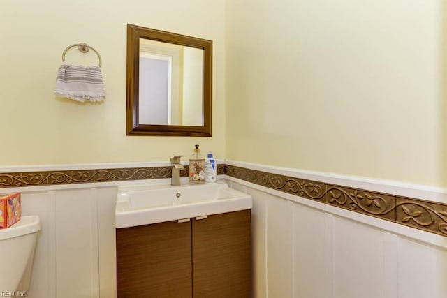 1208 Smith Cove Cir, Virginia Beach, VA 23455 - bathroom featuring a wainscoted wall, a decorative wall, and vanity