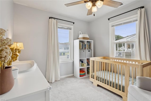 27 Aspenwood Dr, Hampton, VA 23666 - carpeted bedroom with multiple windows, a nursery area, and ceiling fan