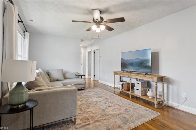 27 Aspenwood Dr, Hampton, VA 23666 - living room with a textured ceiling, wood finished floors, and ceiling fan